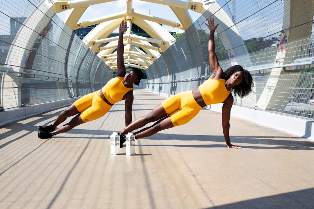 A person stretching or exercising, focusing on joint movements and flexibility.